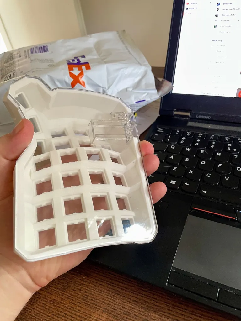 The same half with the clear resin bottom plate fitted, fresh out of the shipping bag